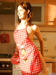 Sexy girl adel has some fun in the kitchen wearing only an..